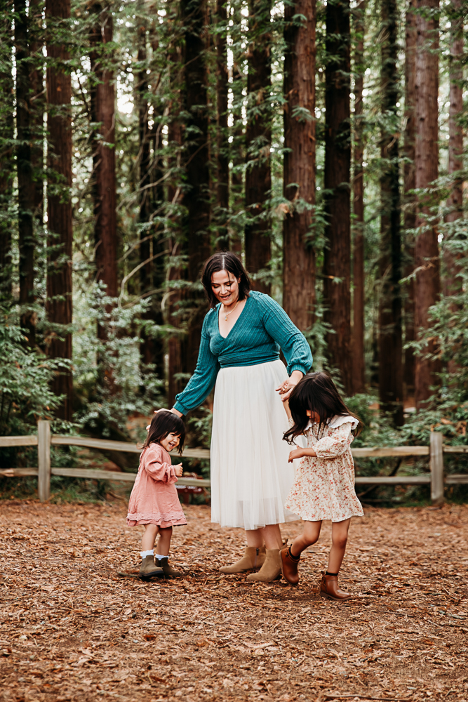 photo of jenn chen dancing with her daughters