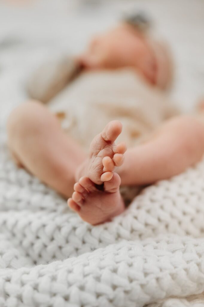 detail photos on tiny newborn toes